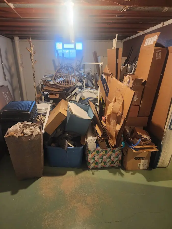 Roll-off dumpster container at job site for Concrete Dumpster Rental in Key Center